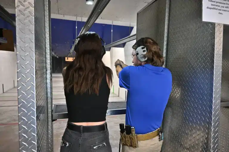 A Nevada Ccw Instructor Shows A Student How To Hold Their Pistol During A Las Vegas Ccw Class At The Range 702.